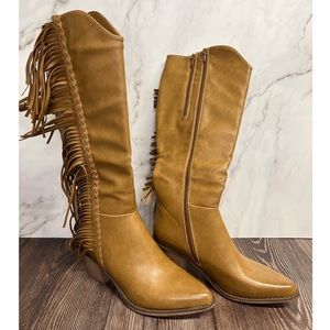 The cutest fringe knee high cowgirl boots.